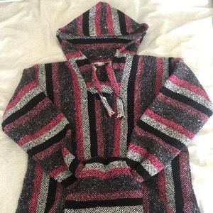 Pink and black poncho